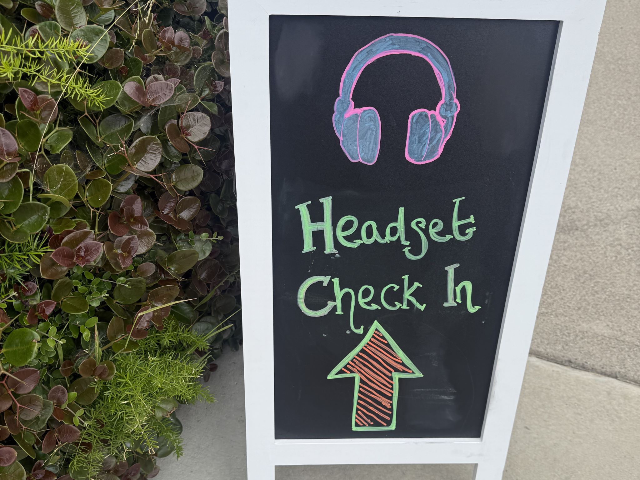 sign headphones check in